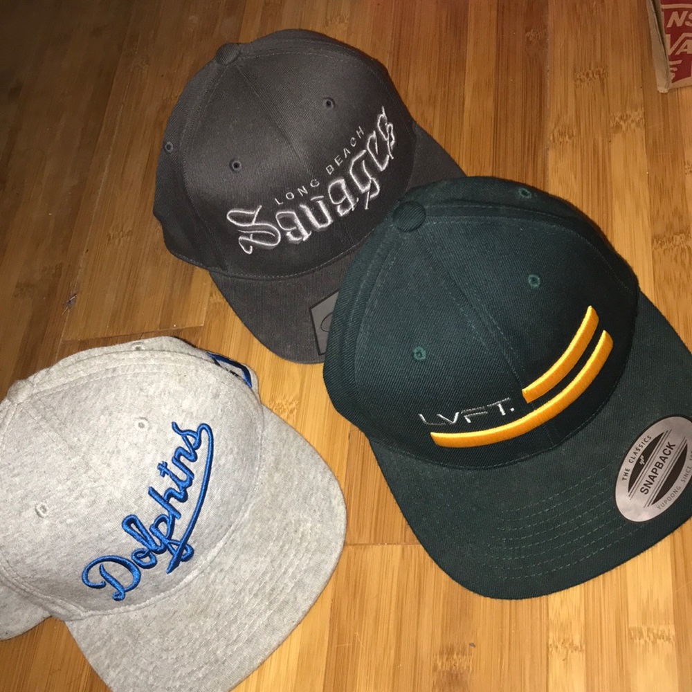 Pink dolphin, longbeach savages, lvft snap backs.